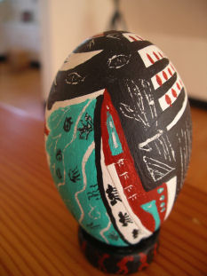 Goose Egg painted in a SouthWest motif w/ants